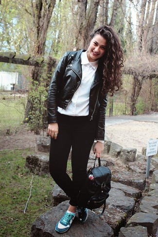 Go for a straightforward but at the same time casually edgy option by wearing a black leather biker jacket and black jeans. A pair of teal low top sneakers effortlesslly revs up the wow factor of your look.