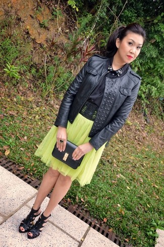 Green-Yellow Pleated Midi Skirt Outfits: You're looking at the indisputable proof that a black leather biker jacket and a green-yellow pleated midi skirt look amazing when teamed together in an off-duty outfit. For something more on the classier end to round off this getup, add black leather heeled sandals to the equation.