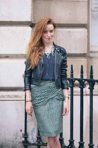 Teal Necklace Outfits: This combination of a black leather biker jacket and a teal necklace gives off this very casual and effortless kind of vibe.