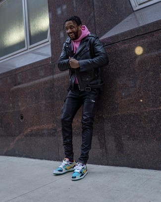 Hot Pink Sweater Outfits For Men: A hot pink sweater and black cargo pants are the kind of a foolproof off-duty outfit that you need when you have no extra time to spare. If you want to effortlessly rev up your look with one single item, add a pair of aquamarine leather low top sneakers to the equation.