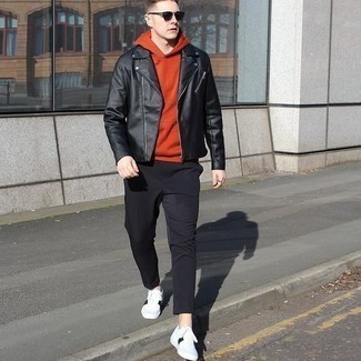 Black Leather Biker Jacket Outfits For Men: Team a black leather biker jacket with black chinos for a fuss-free outfit that's also put together. Add white and black leather low top sneakers to the equation and the whole getup will come together.