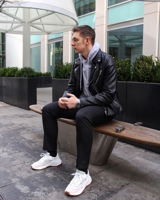 1200+ Casual Chill Weather Outfits For Men: This relaxed combo of a black leather biker jacket and black chinos is a fail-safe option when you need to look cool but have zero time to spare. Feeling bold today? Spice things up by wearing a pair of white athletic shoes.