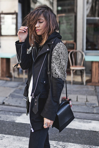 A black embellished leather biker jacket and black skinny jeans? This is an easy-to-wear outfit that anyone could sport on a daily basis.