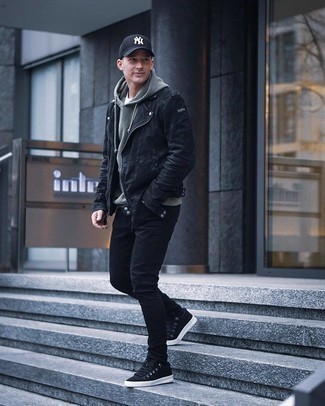Grey Hoodie Outfits For Men: A grey hoodie and black skinny jeans are an edgy combo that every fashionable man should have in his off-duty arsenal. A pair of black canvas low top sneakers will level up this ensemble.