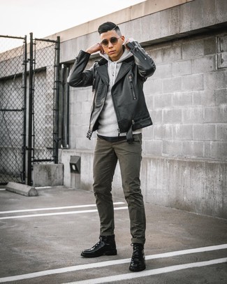 Olive Chinos Outfits: Putting together a black leather biker jacket with olive chinos is an awesome choice for a casual but sharp getup. If you need to easily perk up your look with one item, why not introduce black leather casual boots to the equation?