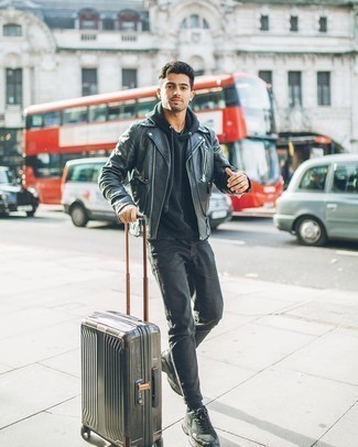 Black Suitcase Outfits For Men: To assemble an off-duty getup with a clear fashion twist, wear a black leather biker jacket with a black suitcase. Want to go all out when it comes to footwear? Introduce black athletic shoes to the mix.