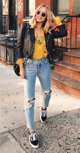 Women's Black Leather Biker Jacket, Yellow Floral Long Sleeve Blouse, Light Blue Ripped Jeans, Black Suede Low Top Sneakers
