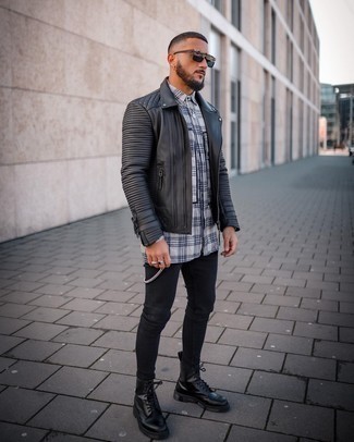 Charcoal Plaid Flannel Long Sleeve Shirt Outfits For Men: This combination of a charcoal plaid flannel long sleeve shirt and black skinny jeans is perfect for dress-down days. Black leather casual boots are an effortless way to bring a dash of polish to your outfit.
