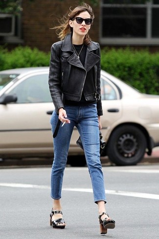 This combination of a black leather biker jacket and blue skinny jeans is well-executed and yet it's laid-back and ready for anything. Finishing off with a pair of black leather heeled sandals is a fail-safe way to inject a dose of refinement into your look.