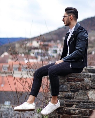 Black Check Chinos Outfits: A black leather biker jacket and black check chinos will convey this relaxed and dapper vibe. A great pair of white canvas low top sneakers ties this ensemble together.