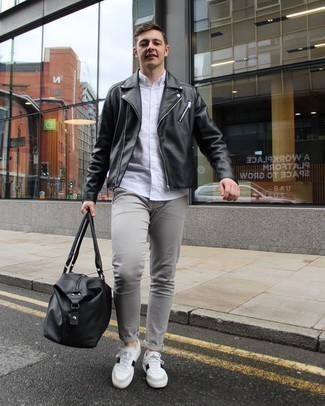White and Red Leather Low Top Sneakers Outfits For Men: If you gravitate towards casual style, why not try pairing a black leather biker jacket with grey chinos? A pair of white and red leather low top sneakers finishes off this ensemble very well.