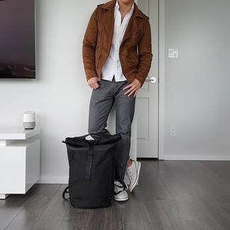 Black Nylon Backpack Outfits For Men: For an ensemble that's super simple but can be styled in a variety of different ways, opt for a brown suede biker jacket and a black nylon backpack. You can get a little creative when it comes to shoes and complement this ensemble with a pair of white leather low top sneakers.