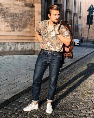 Men's Dark Brown Leather Biker Jacket, Multi colored Floral Short Sleeve Shirt, Navy Jeans, White Canvas Low Top Sneakers