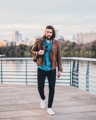 Brown Canvas Backpack Outfits For Men: A brown leather biker jacket and a brown canvas backpack are indispensable staples if you're planning a casual wardrobe that holds to the highest sartorial standards. White canvas low top sneakers will give a dash of elegance to an otherwise too-common getup.