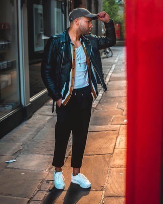 White and Black Athletic Shoes Outfits For Men: If you gravitate towards relaxed casual style, why not consider this combo of a black leather biker jacket and black chinos? Infuse a dash of stylish effortlessness into your ensemble with white and black athletic shoes.