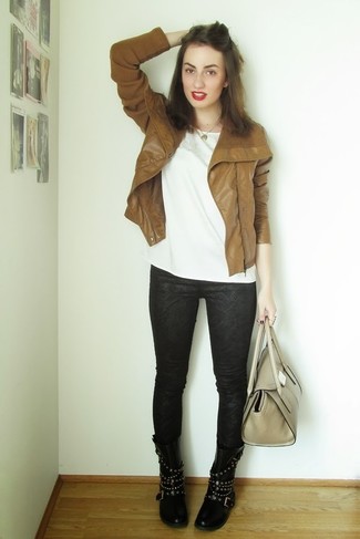 Brown Leather Biker Jacket Outfits For Women: Go for a simple but at the same time casually edgy option teaming a brown leather biker jacket and black print skinny jeans. Complete this outfit with black studded leather lace-up flat boots et voila, the getup is complete.