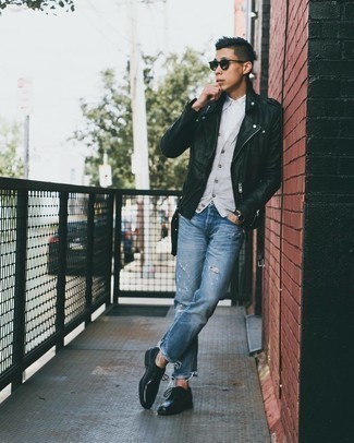 Grey Sweater Vest Outfits For Men: Opt for a grey sweater vest and blue ripped jeans for both on-trend and easy-to-achieve look. Black leather derby shoes are the most effective way to punch up your ensemble.