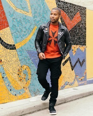 Orange Print Sweatshirt Outfits For Men: If you're facing a fashion situation where comfort is paramount, this combination of an orange print sweatshirt and black cargo pants is always a winner. A pair of black canvas low top sneakers can integrate brilliantly within a great deal of looks.