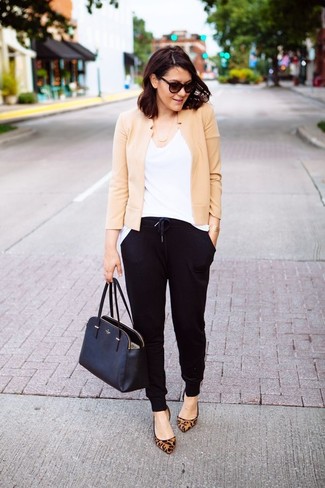 Beige Biker Jacket Outfits For Women: Fashionable and comfortable, this combo of a beige biker jacket and black sweatpants provides with a multitude of styling opportunities. If you wish to instantly up your getup with shoes, slip into a pair of tan leopard suede ballerina shoes.