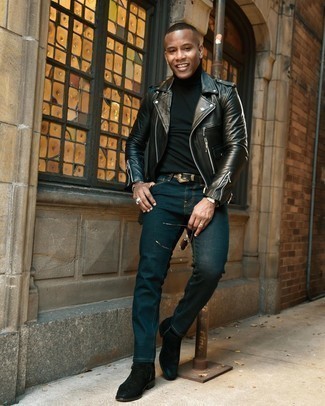 Teal Jeans Outfits For Men: This combo of a black leather biker jacket and teal jeans is a safe and very stylish bet. You can get a bit experimental with footwear and smarten up your ensemble by sporting a pair of black suede chelsea boots.