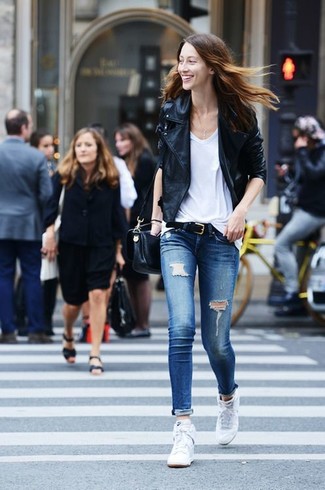 A black leather biker jacket and blue ripped skinny jeans are a cool outfit to keep in your current wardrobe. White high top sneakers are a fail-safe footwear style here that's also full of personality.