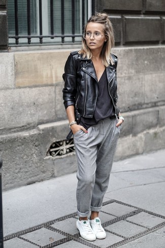 Women's Black Leather Biker Jacket, Black V-neck T-shirt, Grey Tapered Pants, White Leather Low Top Sneakers