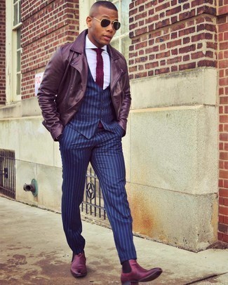 Burgundy Leather Chelsea Boots Outfits For Men: Wear a burgundy leather biker jacket and navy vertical striped dress pants if you want to look on-trend without putting in too much time. If you want to effortlessly perk up your ensemble with shoes, why not complement this look with a pair of burgundy leather chelsea boots?