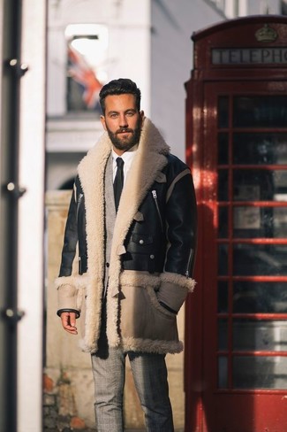 253 Dressy Winter Outfits For Men: This sophisticated pairing of a black and tan shearling jacket and a grey plaid suit will hallmark your outfit coordination skills. With an ensemble like this in your winter wardrobe, you're guaranteed to stay toasty and look stylish despite the cold weather.