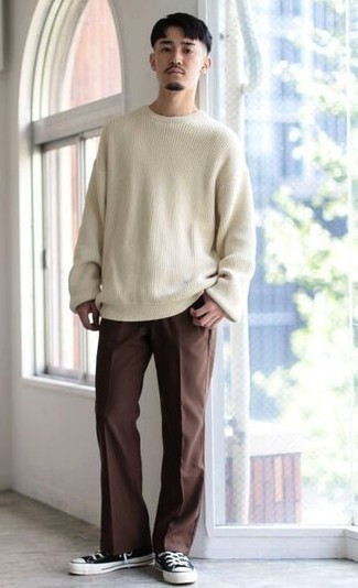 Men's Black and White Canvas Low Top Sneakers, Brown Chinos, White Crew-neck Sweater