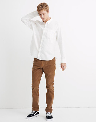 Men's Black and White Canvas Low Top Sneakers, Brown Corduroy Chinos, White Long Sleeve Shirt