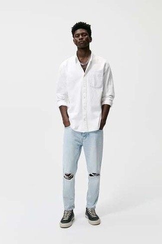 Men's Black and White Canvas Low Top Sneakers, Light Blue Jeans, White Long Sleeve Shirt