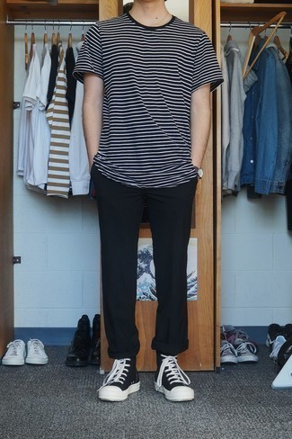 Black Horizontal Striped Crew-neck T-shirt Outfits For Men: This combo of a black horizontal striped crew-neck t-shirt and black chinos is perfect for lazy days. Complete this ensemble with a pair of black and white canvas high top sneakers to effortlessly boost the style factor of this look.