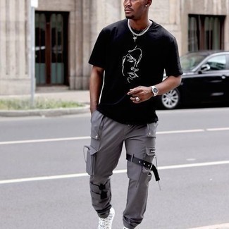 Charcoal Cargo Pants Outfits: This off-duty pairing of a black and white print crew-neck t-shirt and charcoal cargo pants is a tested option when you need to look dapper but have zero time to assemble a look. All you need is a pair of grey print canvas high top sneakers to round off your outfit.