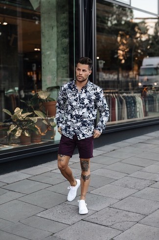 Black Floral Long Sleeve Shirt Outfits For Men: This off-duty combination of a black floral long sleeve shirt and dark purple shorts is extremely easy to throw together without a second thought, helping you look on-trend and ready for anything without spending too much time combing through your wardrobe. White canvas low top sneakers look amazing finishing off this outfit.