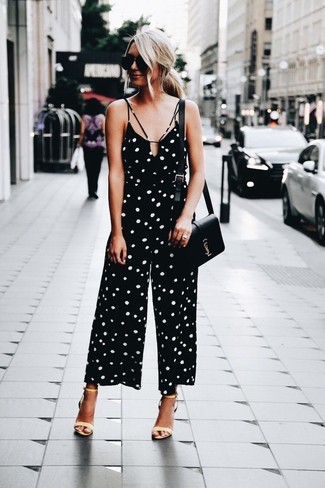 Beige Leather Heeled Sandals Outfits: This ensemble with a black and white polka dot jumpsuit isn't so hard to assemble and leaves room to more experimentation. Feeling experimental today? Elevate your outfit by slipping into a pair of beige leather heeled sandals.