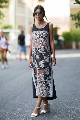 Black Lace Maxi Dress Outfits: If you gravitate towards relaxed casual style, why not consider this combination of a black lace maxi dress and a black mini skirt? For a classier feel, add a pair of white leather heeled sandals to the equation.