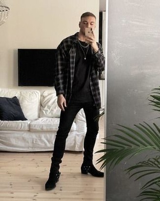 Black Jeans Outfits For Men: The versatility of a black and white plaid long sleeve shirt and black jeans means they'll stay on permanent rotation in your menswear arsenal. Black suede chelsea boots add a classic aesthetic to the getup.