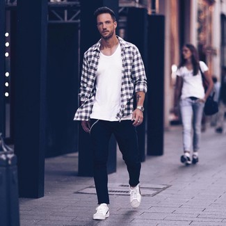 Men's Black and White Plaid Flannel Long Sleeve Shirt, White Tank, Black Jeans, White and Black Leather Low Top Sneakers
