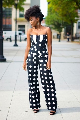 Rushed mornings require a simple yet stylish look, such as a black and white polka dot jumpsuit. To bring a bit of flair to this outfit, introduce black leather heeled sandals to the mix.
