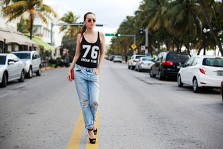 Black Tank Outfits For Women: Marrying a black tank with light blue ripped boyfriend jeans is a smart pick for an off-duty yet seriously chic look. If you want to immediately glam up your outfit with shoes, why not complement your look with a pair of black suede heeled sandals?