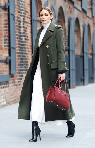 Olivia Palermo wearing Red Leather Tote Bag, Black Leather Ankle Boots, White Sweater Dress, Dark Green Coat