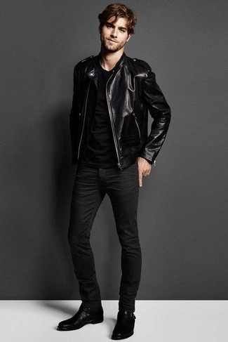 Nail the casually cool outfit in a black leather biker jacket and black skinny jeans. To give your outfit a dressier feel, introduce black leather chelsea boots to the mix.