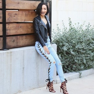 Aquamarine Jeans Outfits For Women: Opt for a black leather biker jacket and aquamarine jeans for a comfy look that's also put together. Step up your look with a pair of burgundy suede heeled sandals.