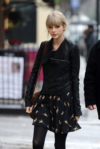 Wear a black suede biker jacket and a black print skater dress to create a totaly stylish ensemble.