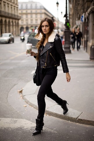 Go for a straightforward but cool and relaxed option by pairing a black leather biker jacket and black skinny jeans. And if you need to immediately step up this look with shoes, why not introduce a pair of black leather ankle boots to the equation?