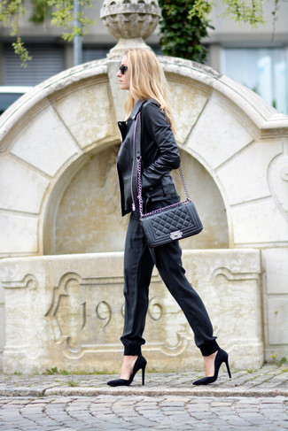 Black Sweatpants Outfits For Women: This combo of a black leather biker jacket and black sweatpants is beyond versatile and creates instant appeal. Here's how to class up this ensemble: black suede pumps.