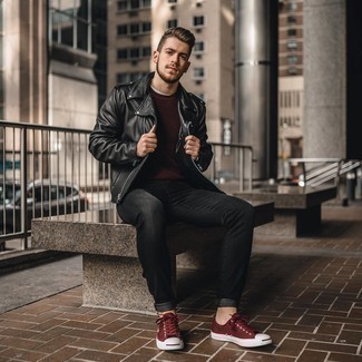 Red Canvas Low Top Sneakers Outfits For Men: A black leather biker jacket looks especially cool when worn with black jeans. A pair of red canvas low top sneakers is a savvy choice to round off your ensemble.