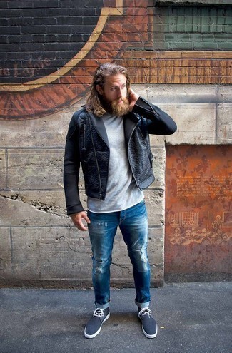 Black Leather Jacket with Blue Pants Outfits For Men: If you're all about being comfortable when it comes to styling, this pairing of a black leather jacket and blue pants will totally vibe with you. Unimpressed with this getup? Enter navy canvas desert boots to jazz things up.
