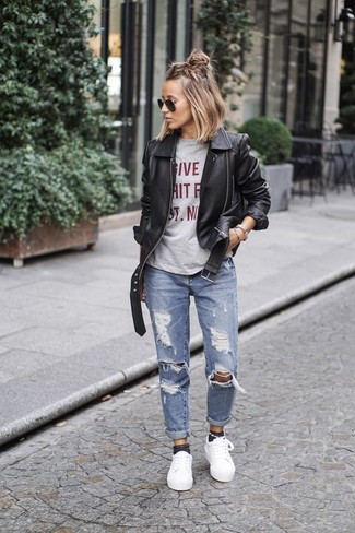 Grey Print Crew-neck T-shirt Outfits For Women: This combination of a grey print crew-neck t-shirt and light blue ripped boyfriend jeans is hard proof that a straightforward casual ensemble doesn't have to be boring. Add white low top sneakers to this getup to immediately bump up the chic factor of this outfit.