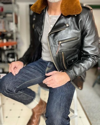 Black Jacket Outfits For Men: This combination of a black jacket and navy jeans will cement your prowess in men's fashion even on dress-down days. Add a pair of brown leather chelsea boots to the mix to effortlessly bump up the wow factor of this getup.
